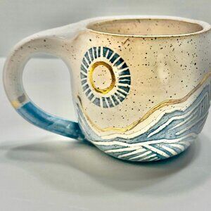 Handcrafted Ceramic Mug With Sun & Mountain Design By Coco Chispa
